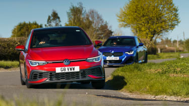 BMW 230i M Sport v Volkswagen Golf GTI Clubsport – pictures | evo